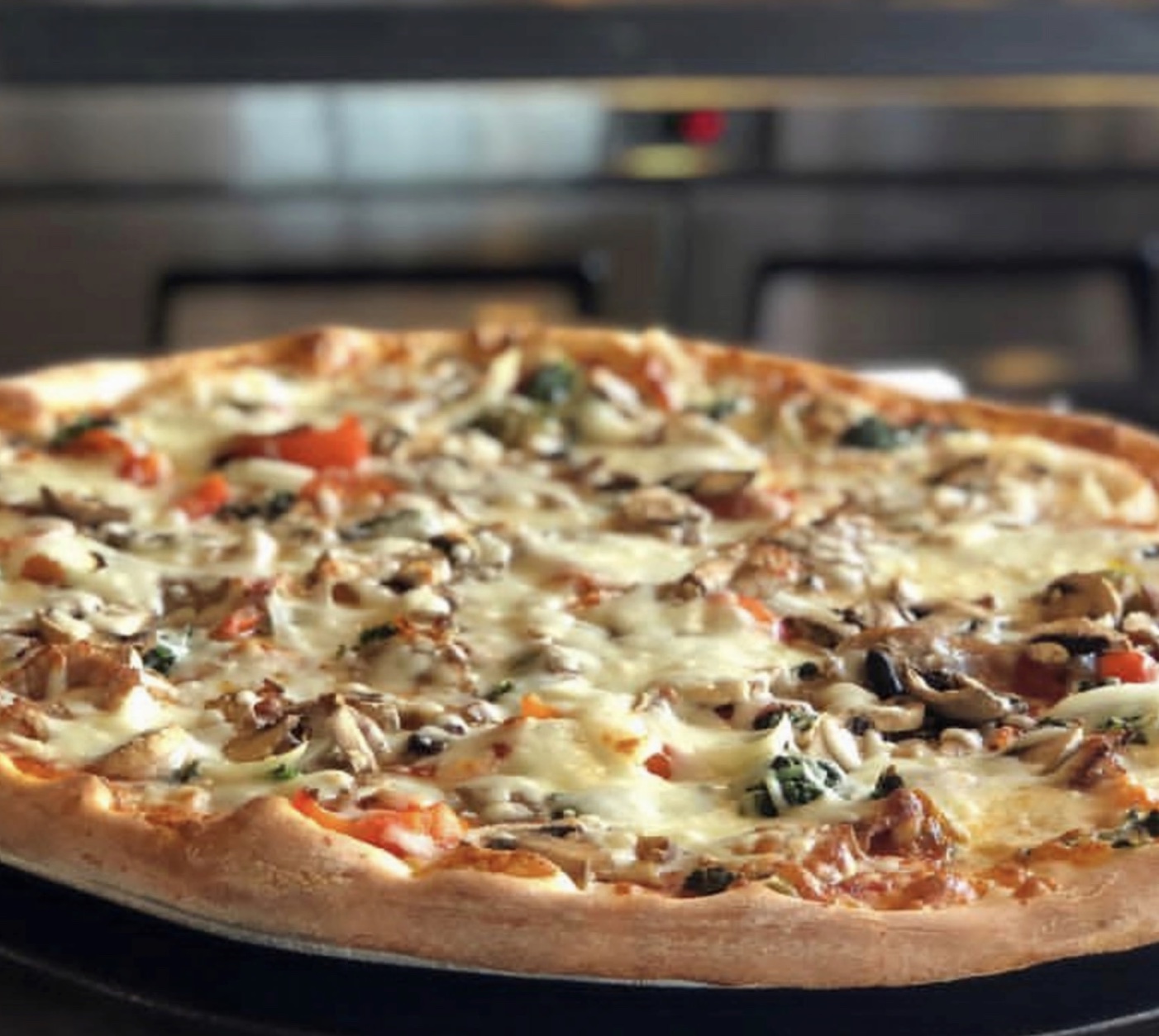 Freshly baked pizza at Alba's Pizzeria